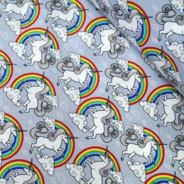 100% Cotton Poplin Fabric Proud & Beautiful Unicorns in a Cloudy Rainbow Sky Silver